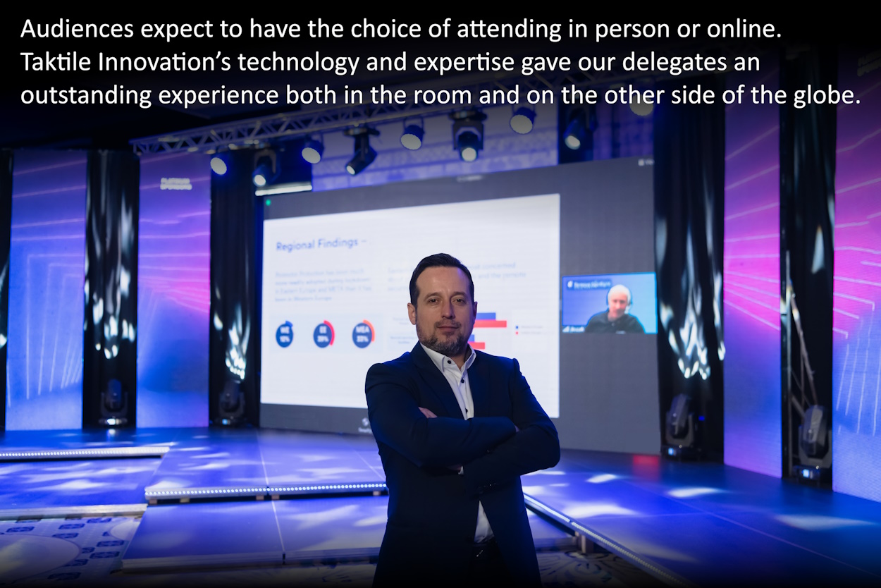 Taktile Splash Image - Man in front of large screens
